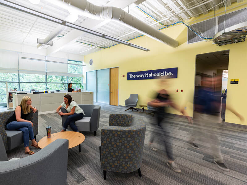 CarMax dimensional sign in office space interior for executive area of home office.